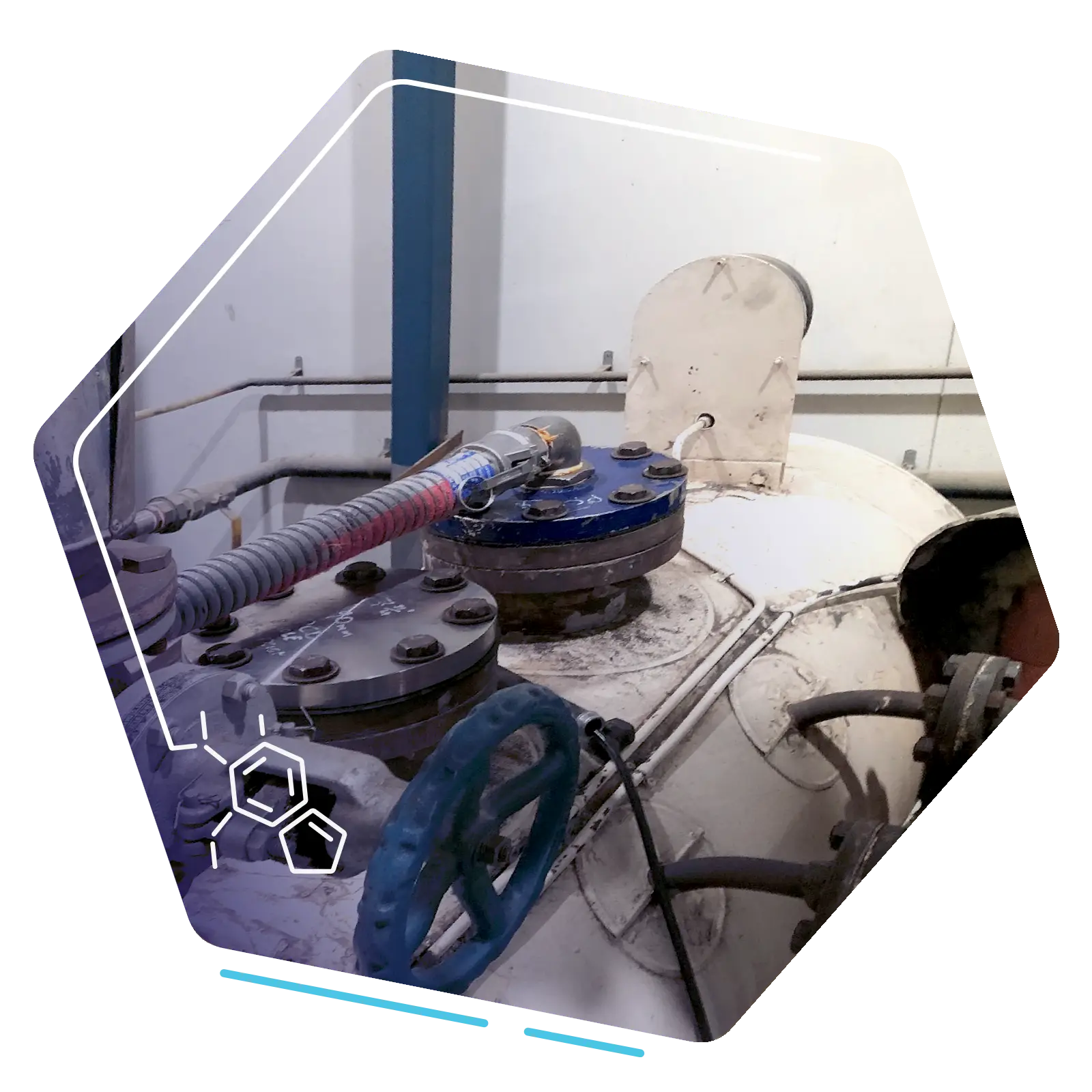Large industrial vessel with flexible hoses connected to upper access points